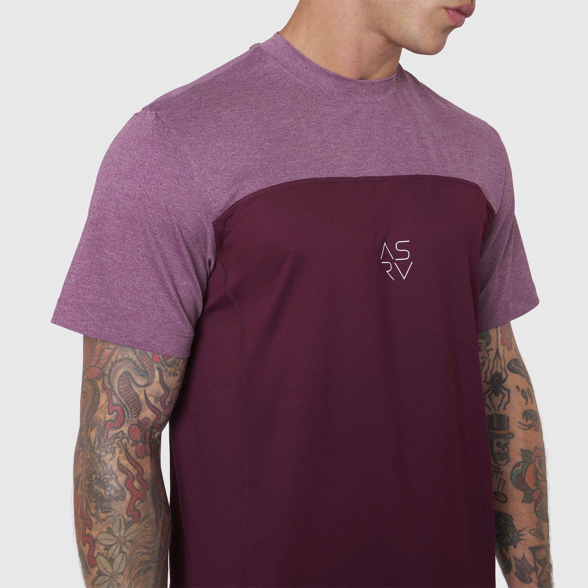 AEROSILVER® UPF50+ Run Tee in merlot and mauve colorblock, worn by model showing front