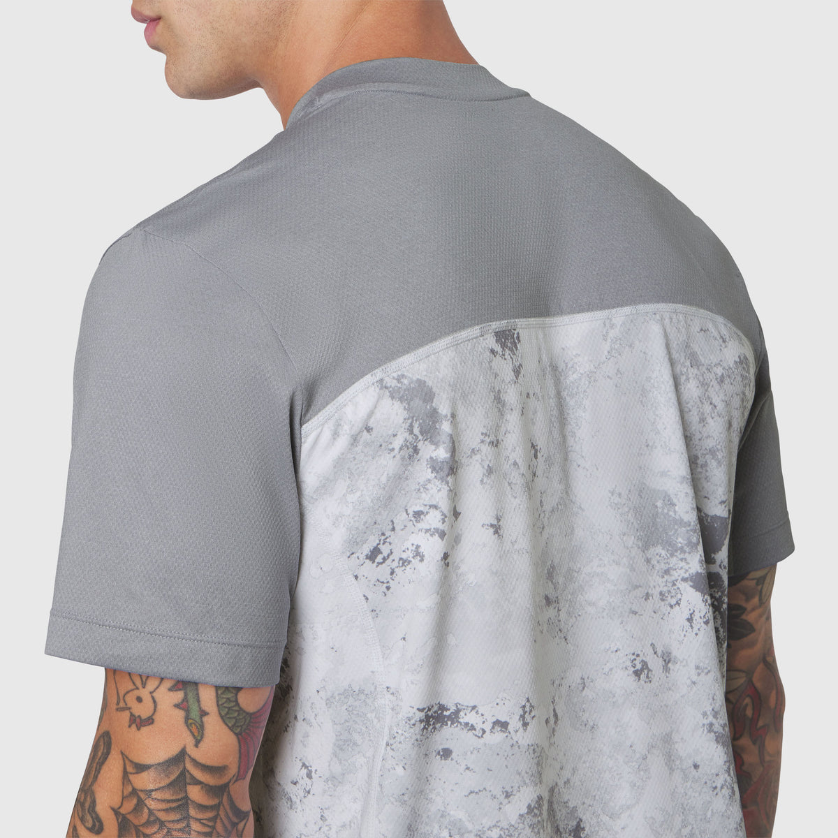 AEROSILVER® UPF50+ Run Tee in Sedona Snow Camo worn by model, back view