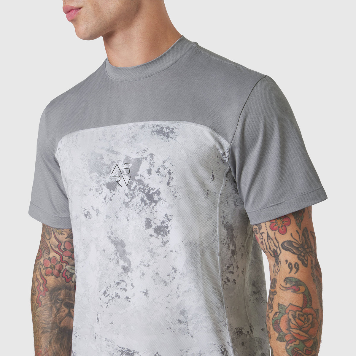 AEROSILVER® UPF50+ Run Tee in Sedona Snow Camo worn by male model, front view