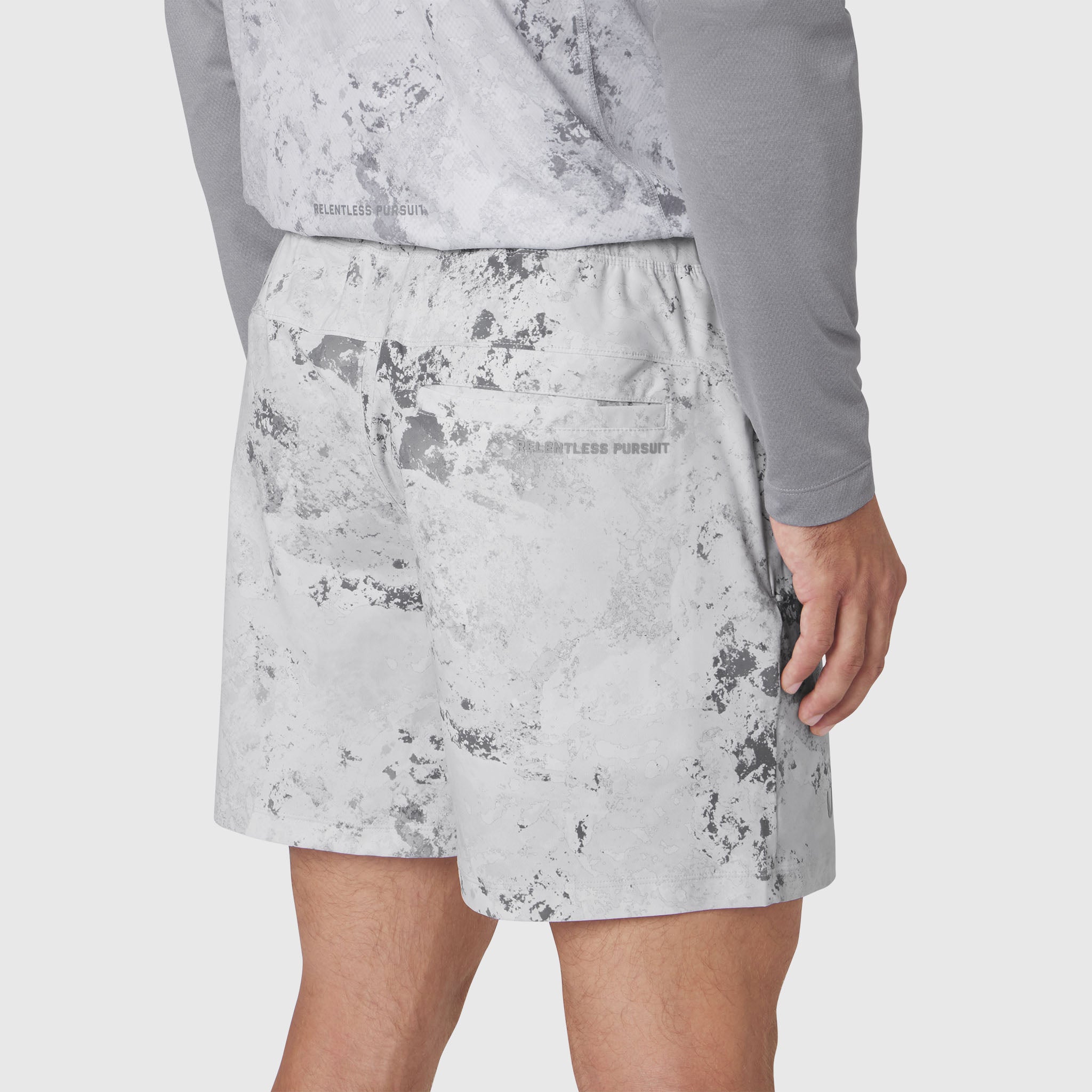 Revolutional Training Short in Sedona Snow Camo worn by model, side view