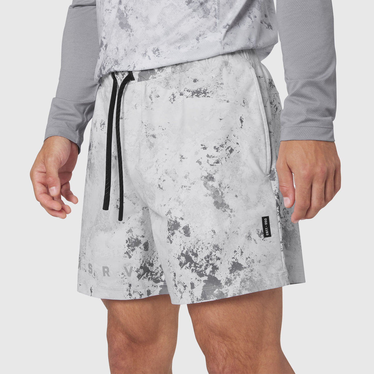 Revolutional Training Short in Sedona Snow Camo worn by model, front view