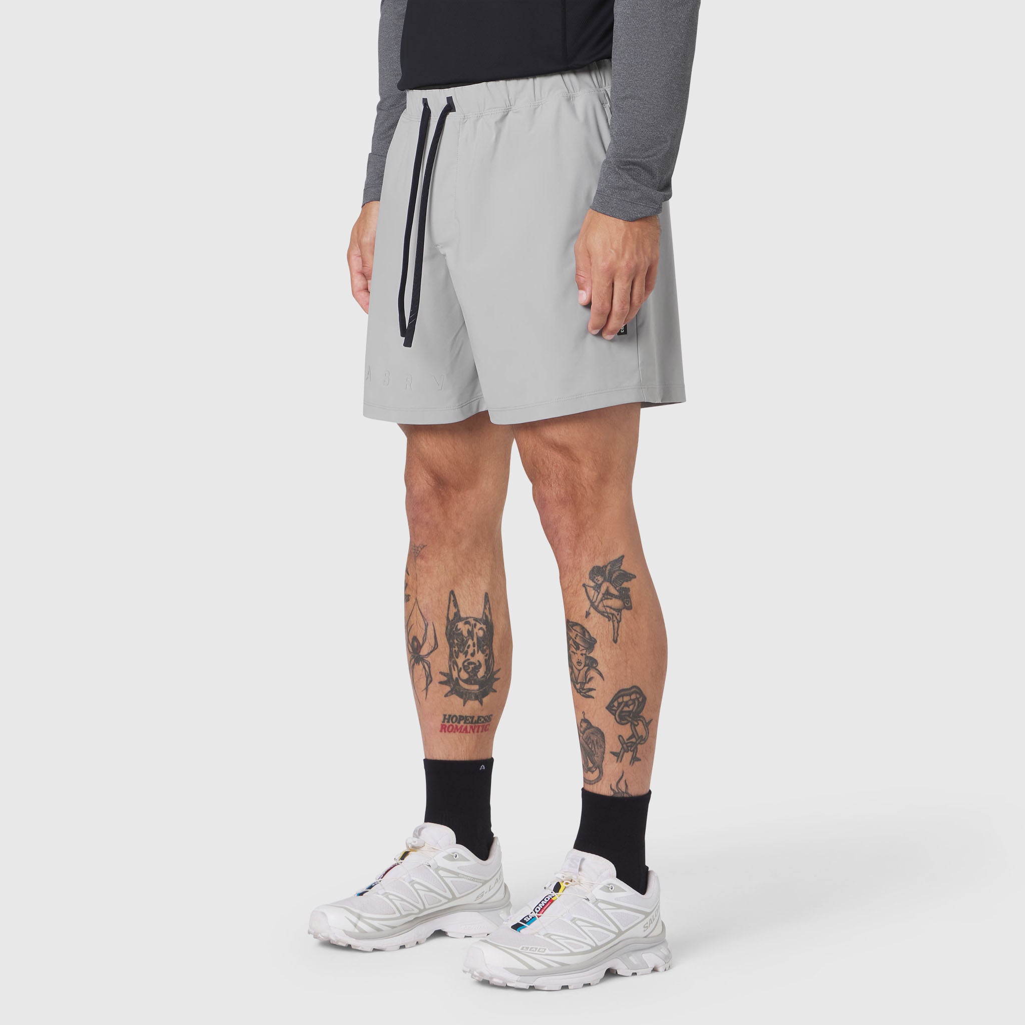 Revolutional Training Short in slate grey worn by model, side view