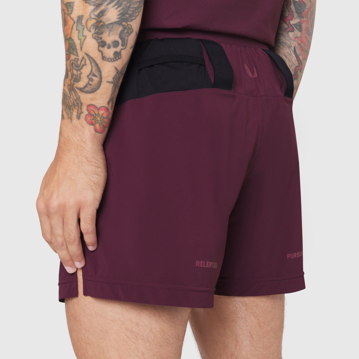 Aerotex Distance Run Short in merlot worn by model, side view
