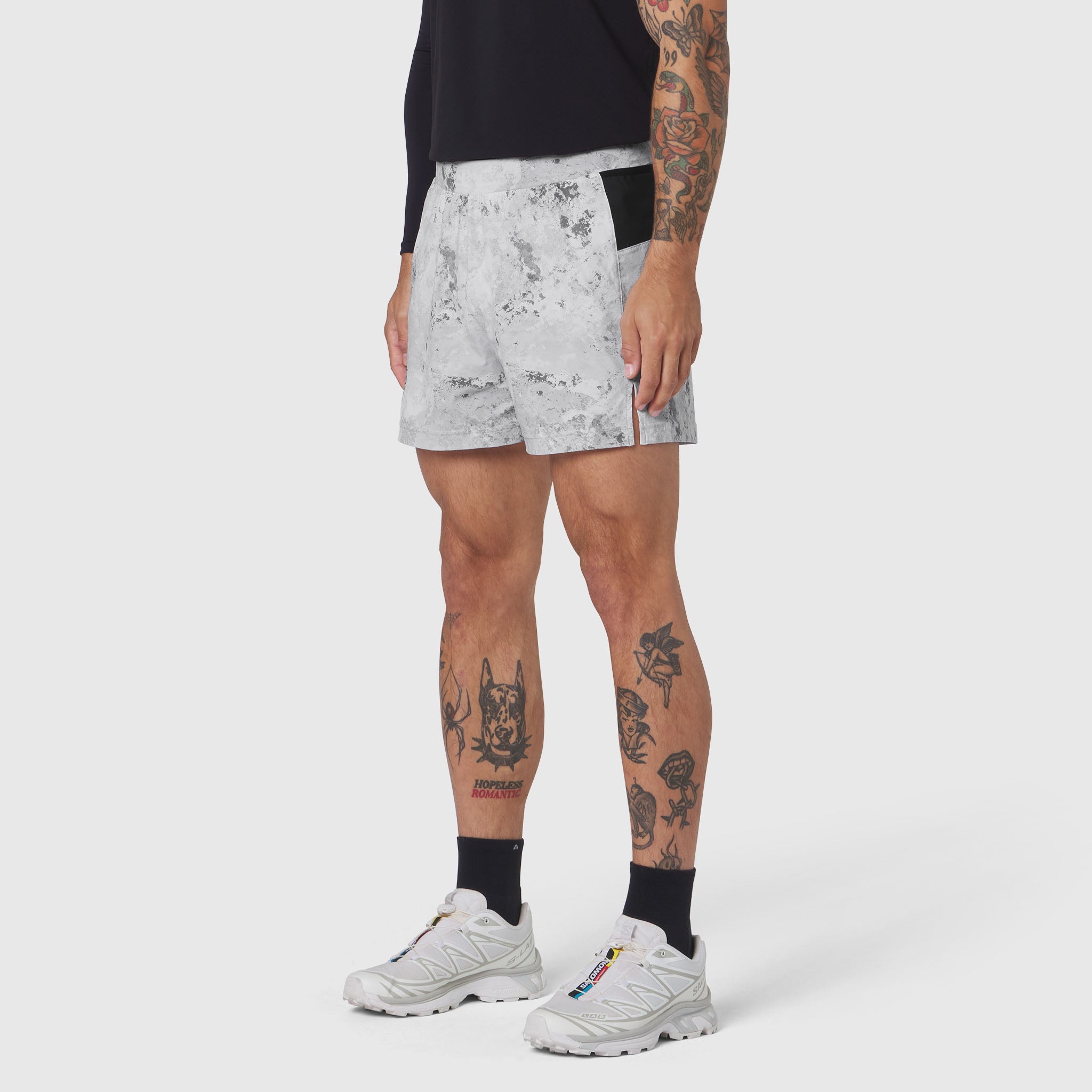 Aerotex Distance Run Short in Sedona Snow Camo worn by model, front view