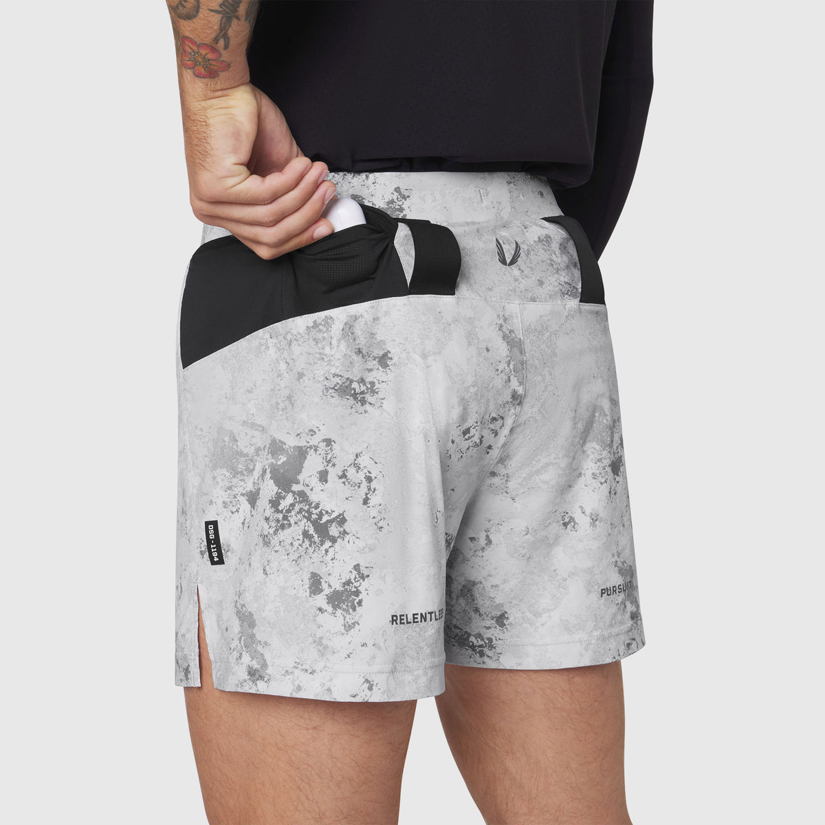 Aerotex Distance Run Short in Sedona Snow Camo worn by model, back view
