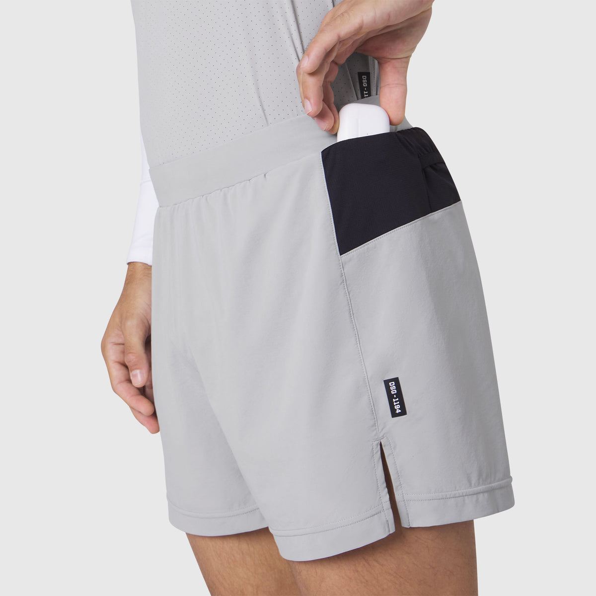 Aerotex™ Distance Run Short in Slate Grey, model wearing shorts with hand in pocket