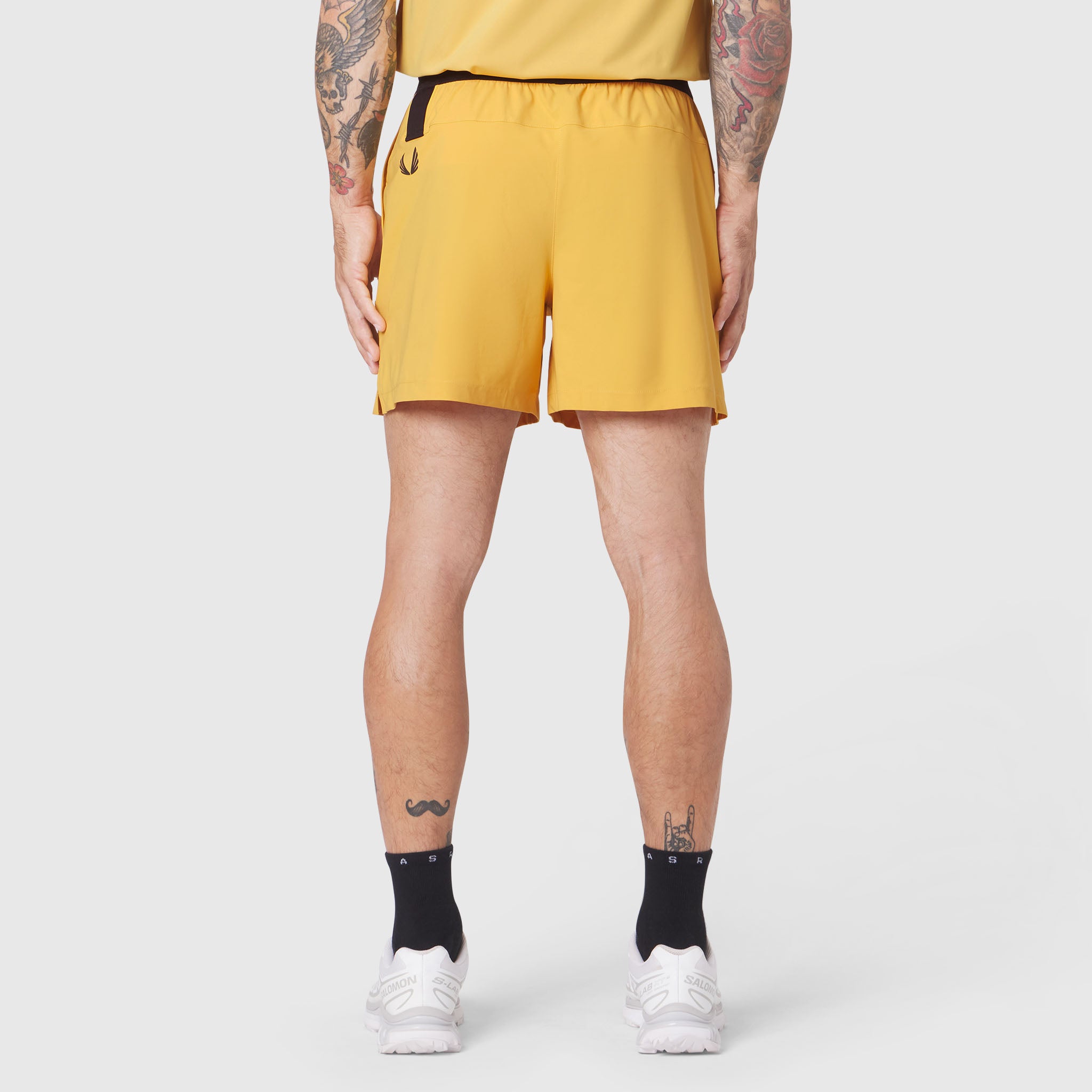 Tetra-Lite 5" Linerless Training Short in amber, worn by model from behind