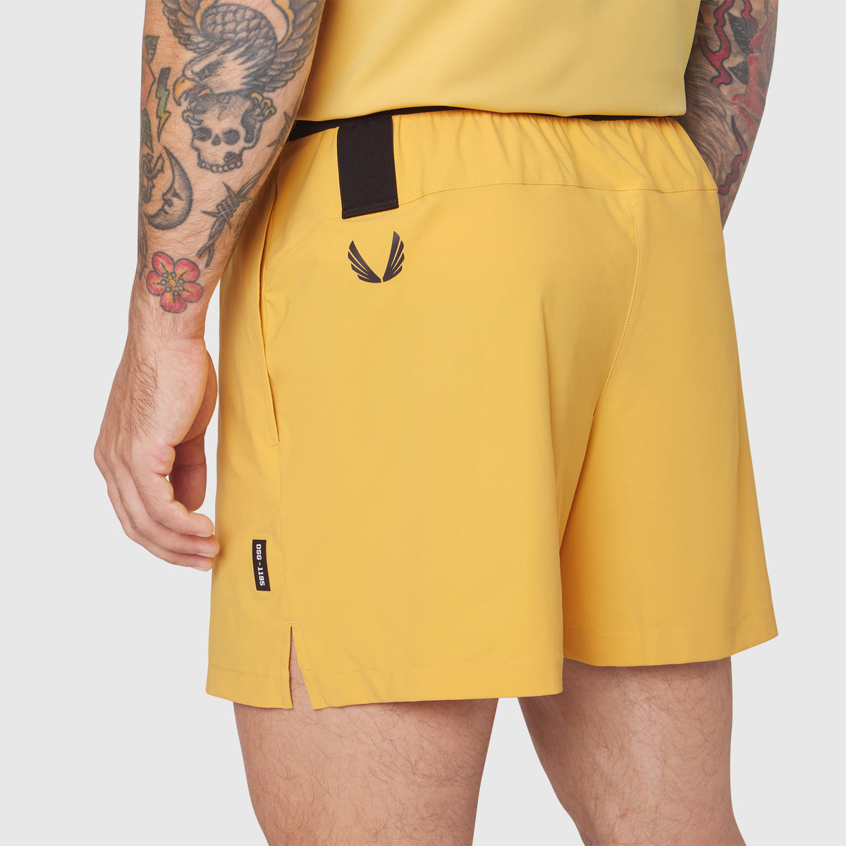 TETRA-LITE® 5" Linerless Training Short in amber, worn by model showing back view