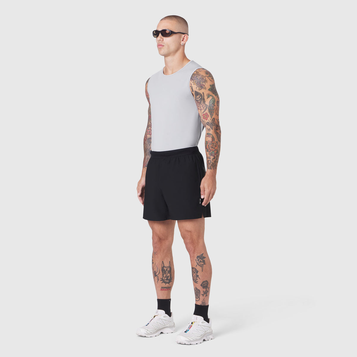 TETRA-LITE® 5" Linerless Training Short in black, worn by model in side profile stance