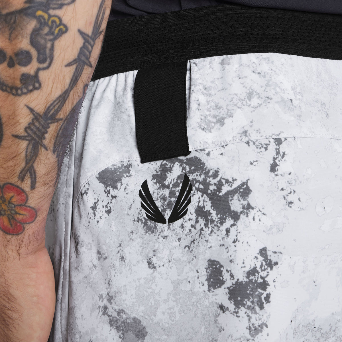 Tetra-Lite 5" training short in Sedona Snow Camo, worn by model with visible tattoos