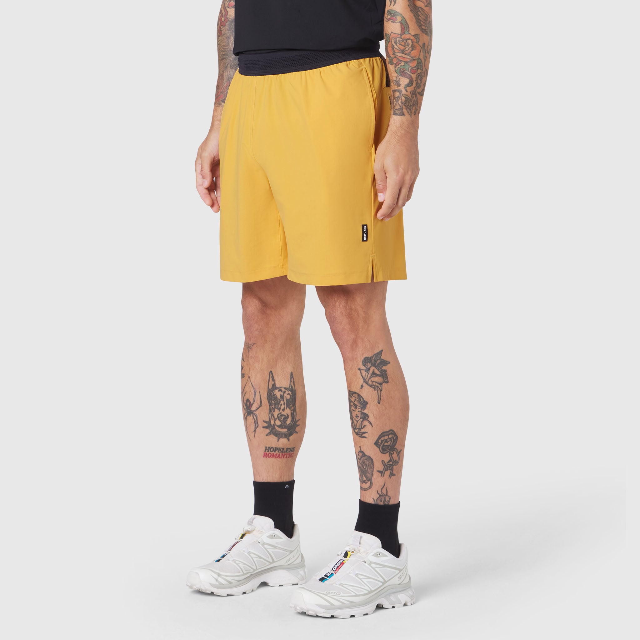 Amber TETRA-LITE® 7" Linerless Training Short worn by model, front side view