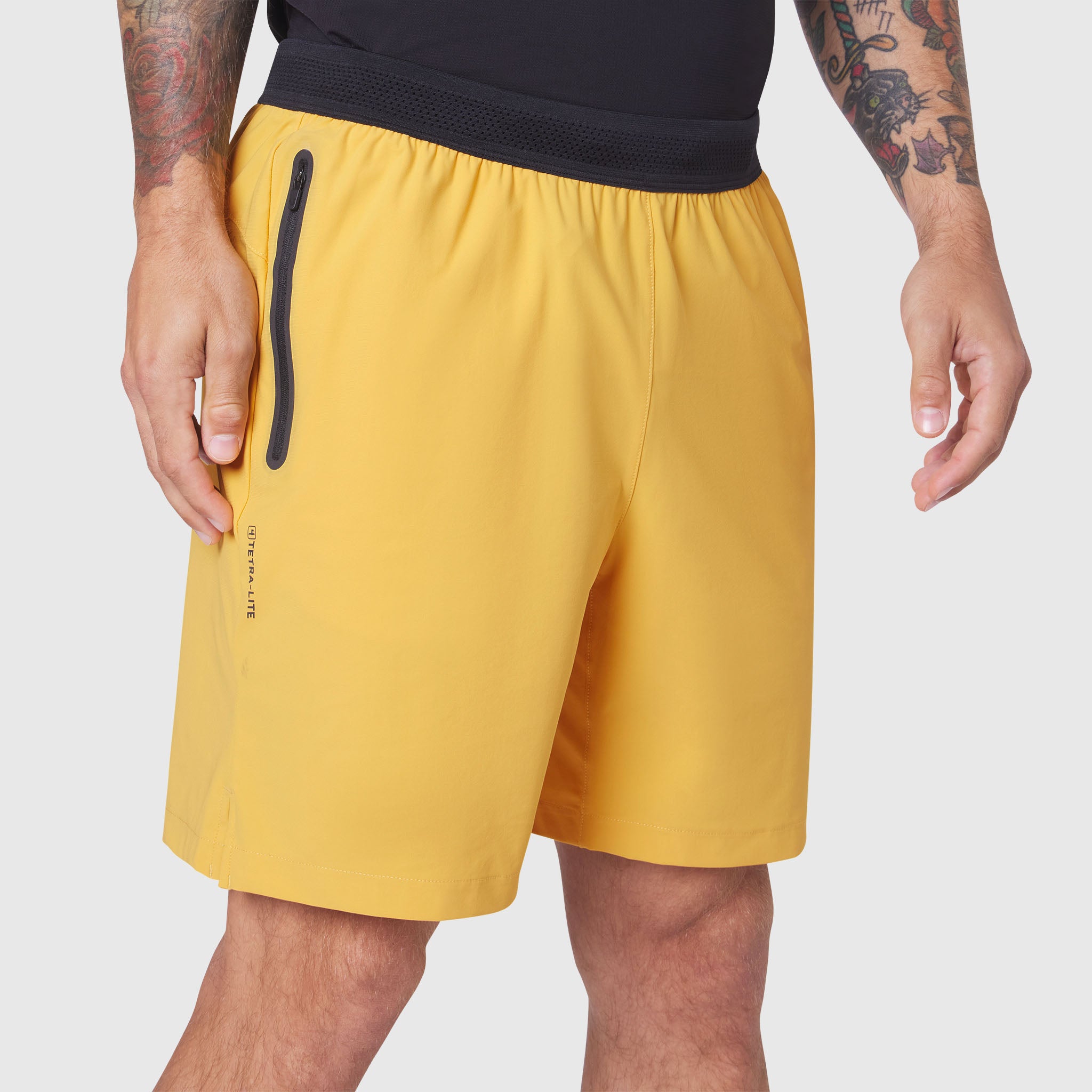 TETRA-LITE 7" Linerless Training Short in Amber, worn by model, front view