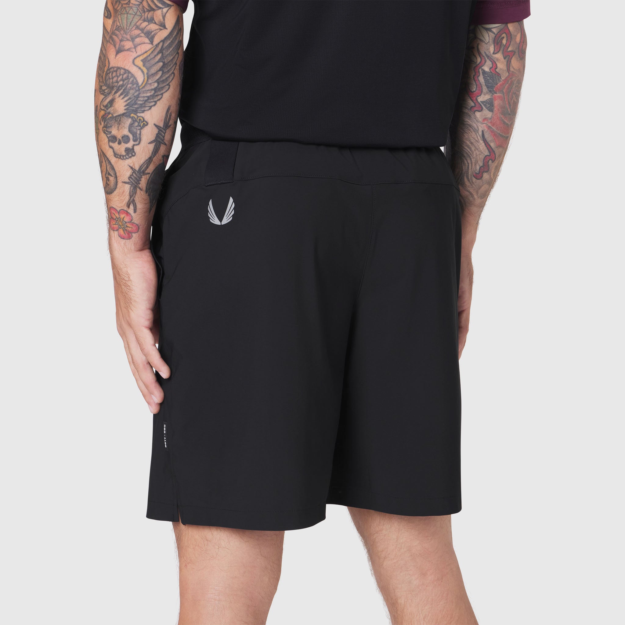 Black TETRA-LITE 7" Linerless Training Short worn by model, back view