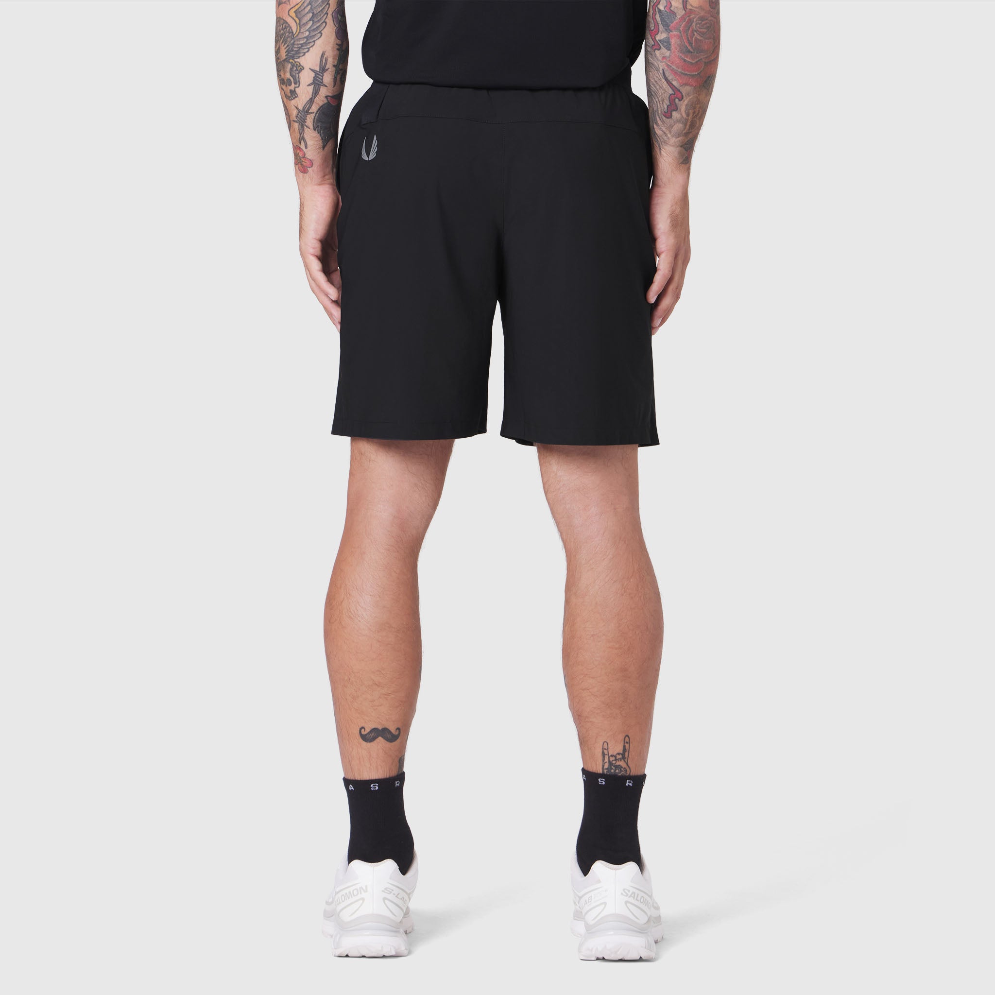TETRA-LITE® 7" Linerless Training Short in black, back view on model