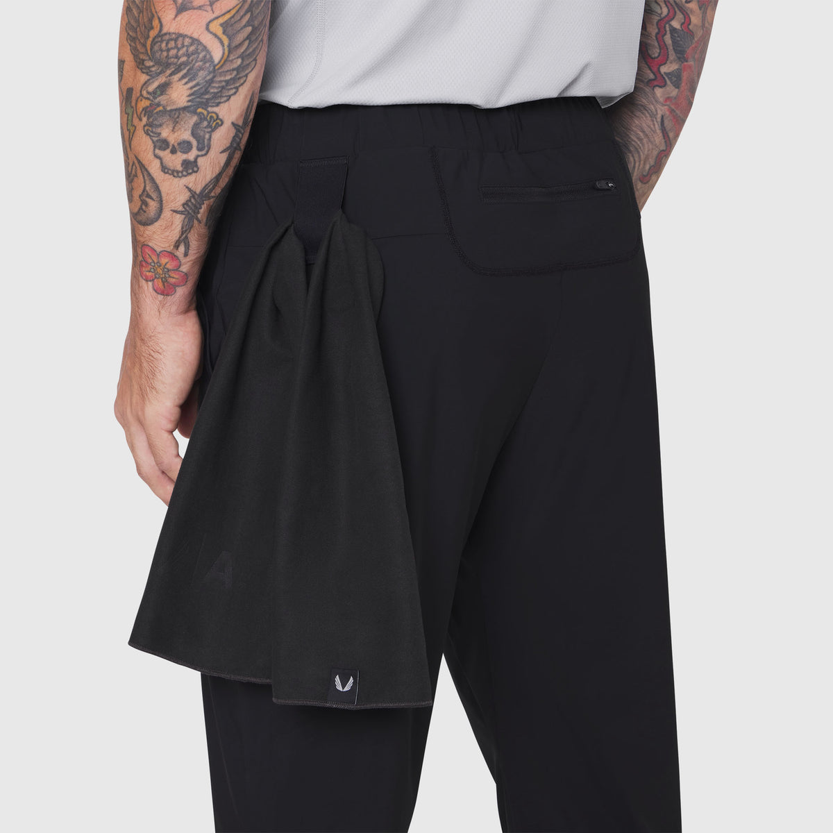 Black TETRA-LITE Training Jogger worn by model, back view showing fit and design details