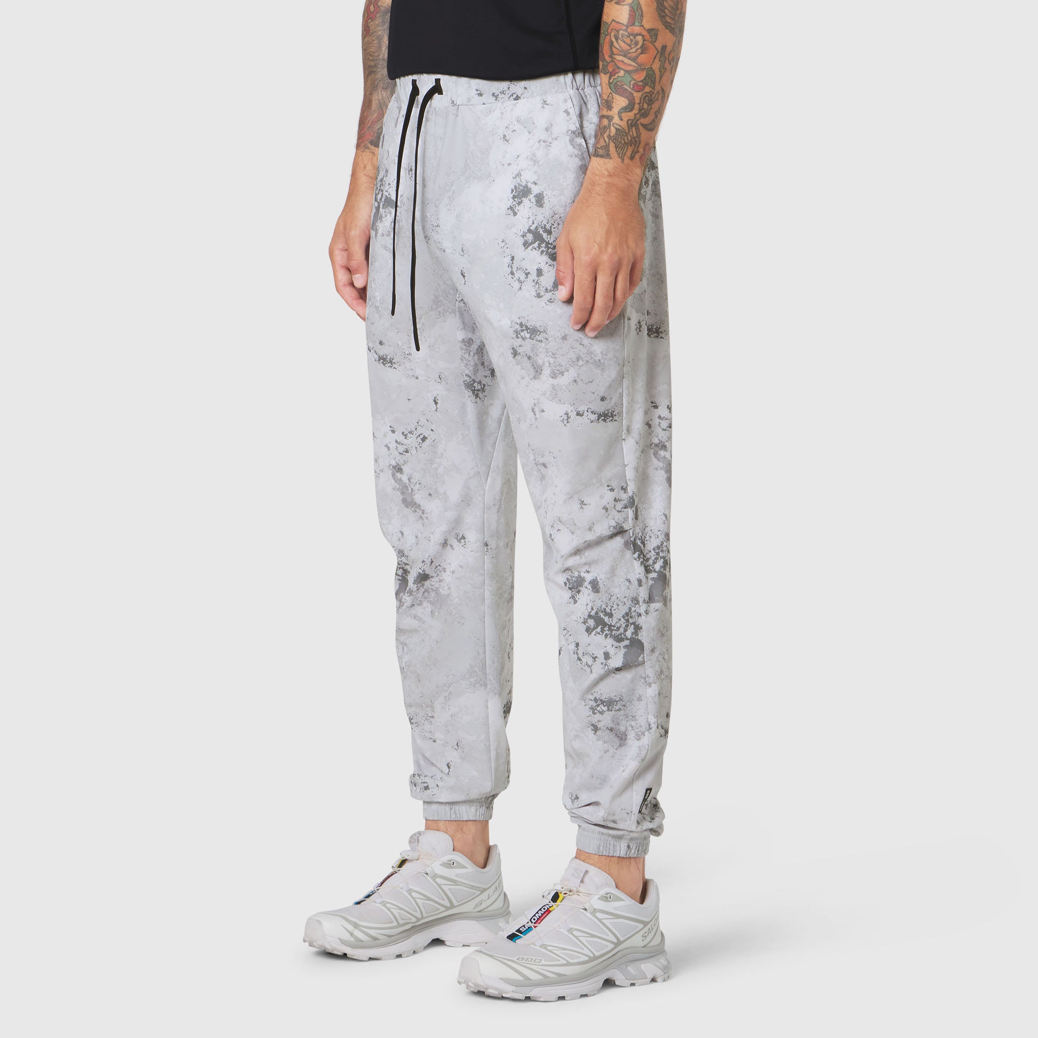 TETRA-LITE Training Jogger in Sedona Snow Camo worn by model, side view