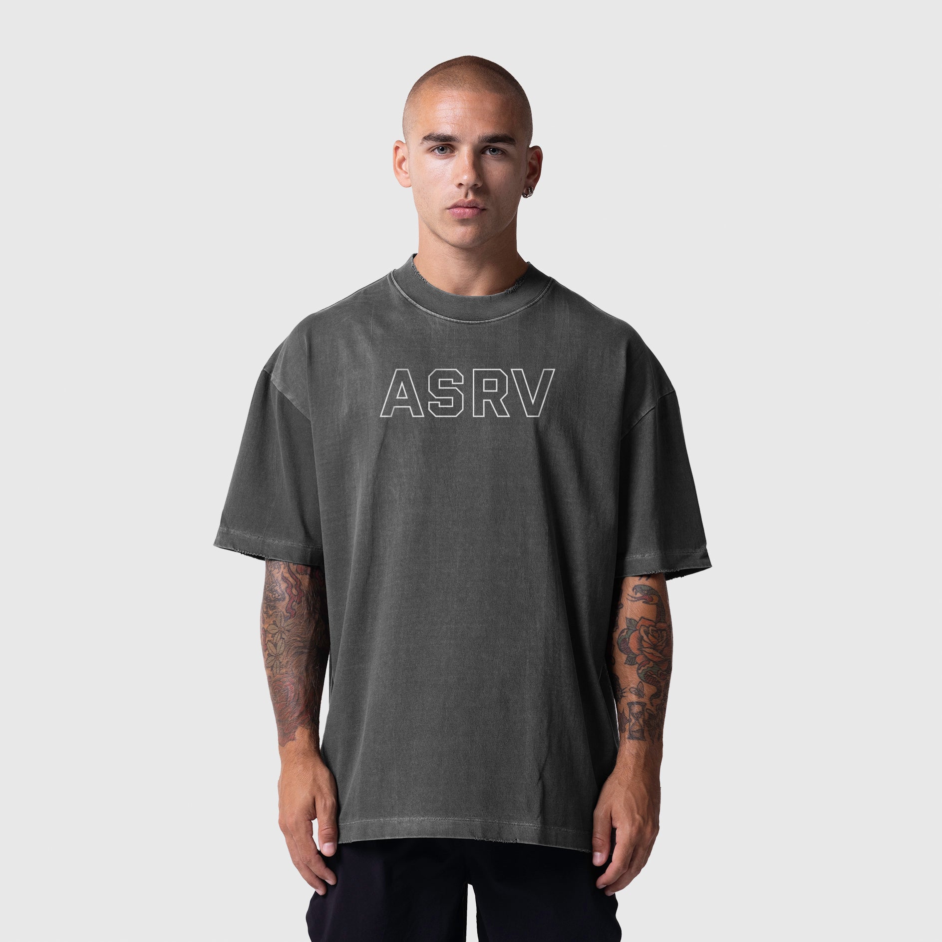 Model wearing ASRV Tech Essential Oversized Boxy Tee in Faded Grey Outline, front view