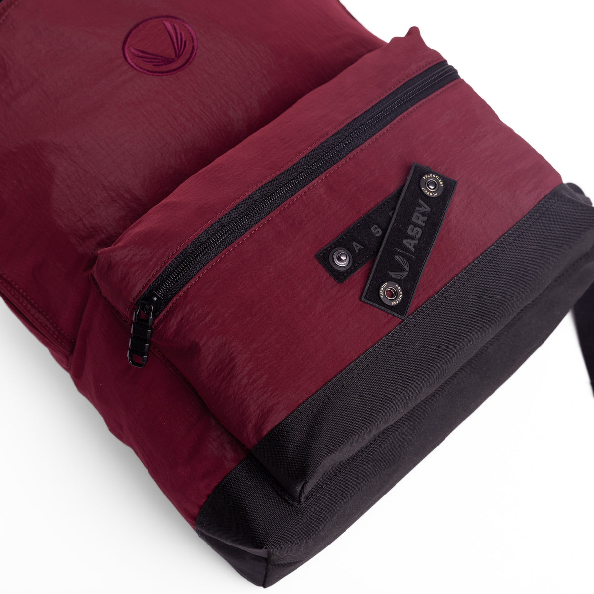 Flatlay 1233 Ripstop Backpack in crimson, angled view