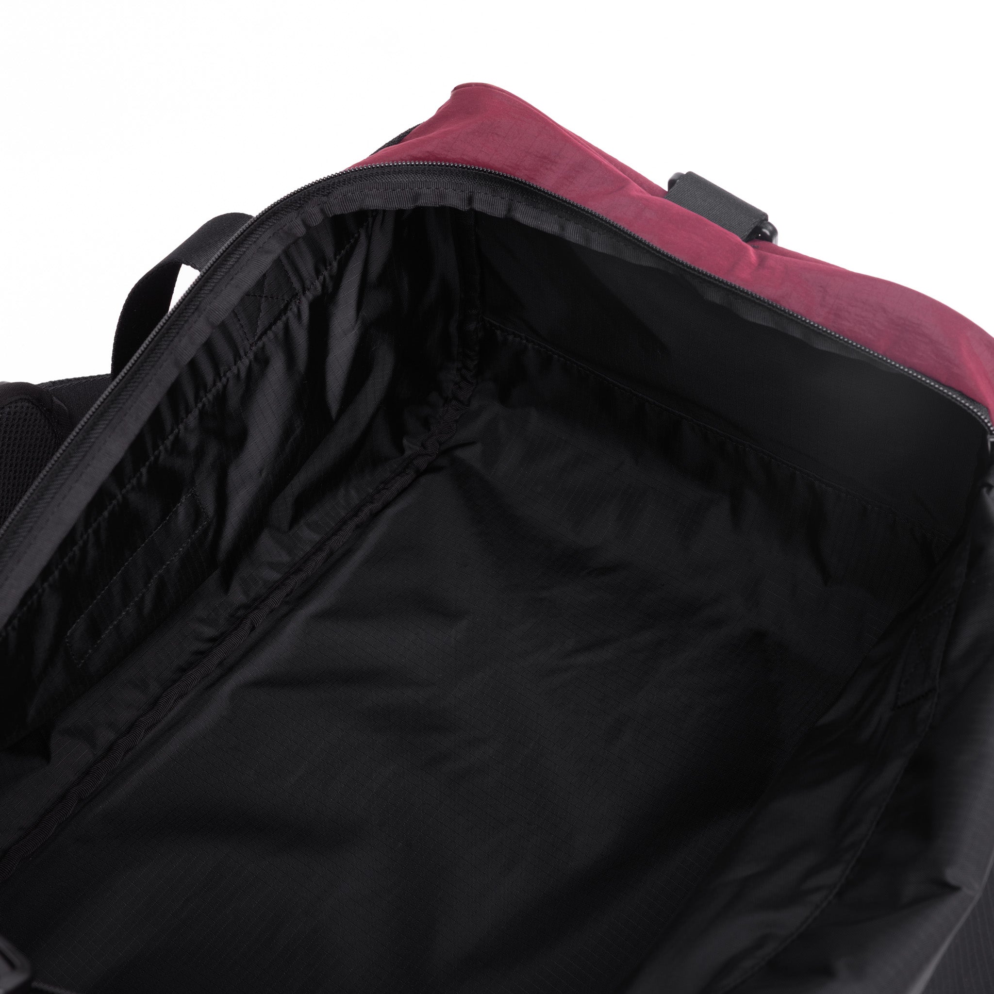 Flatlay 1234 Ripstop Duffle Bag in Crimson, open interior view