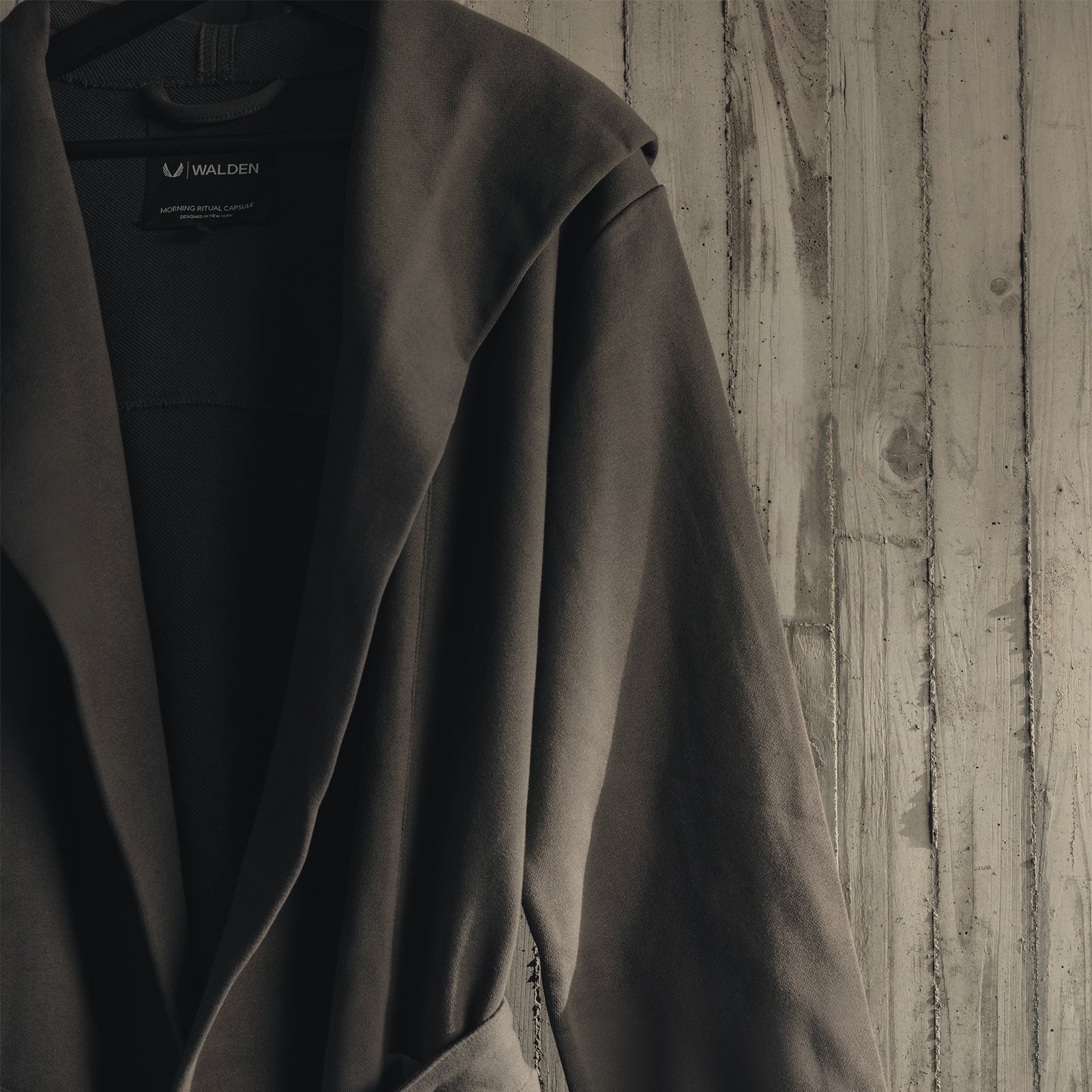 ASRV x Walden Heavyweight Robe in carbon being held, displaying fabric drape and texture