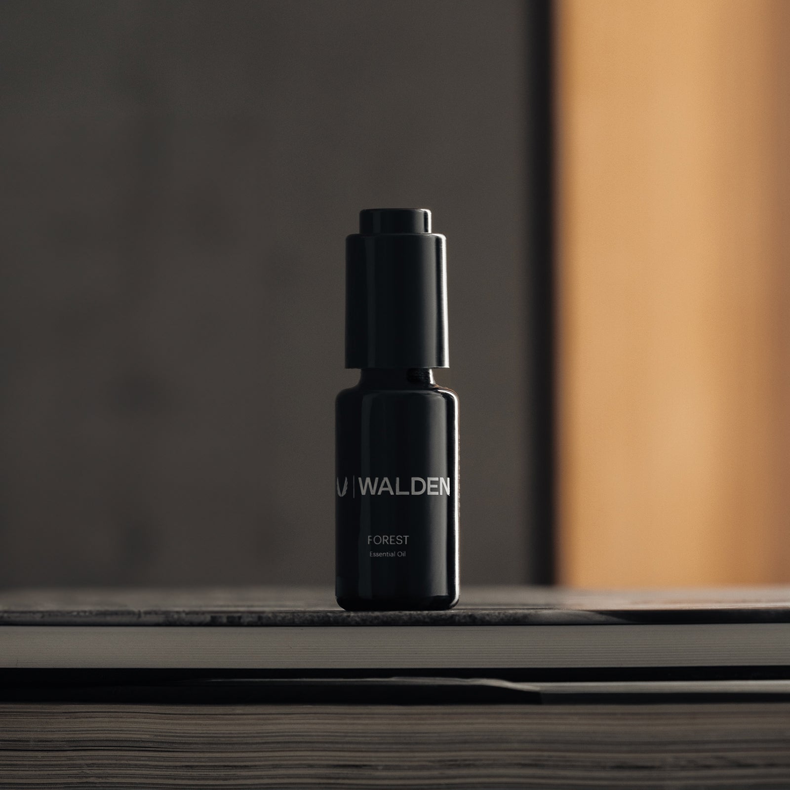 of ASRV x Walden Forest Essential Oil in black, front view