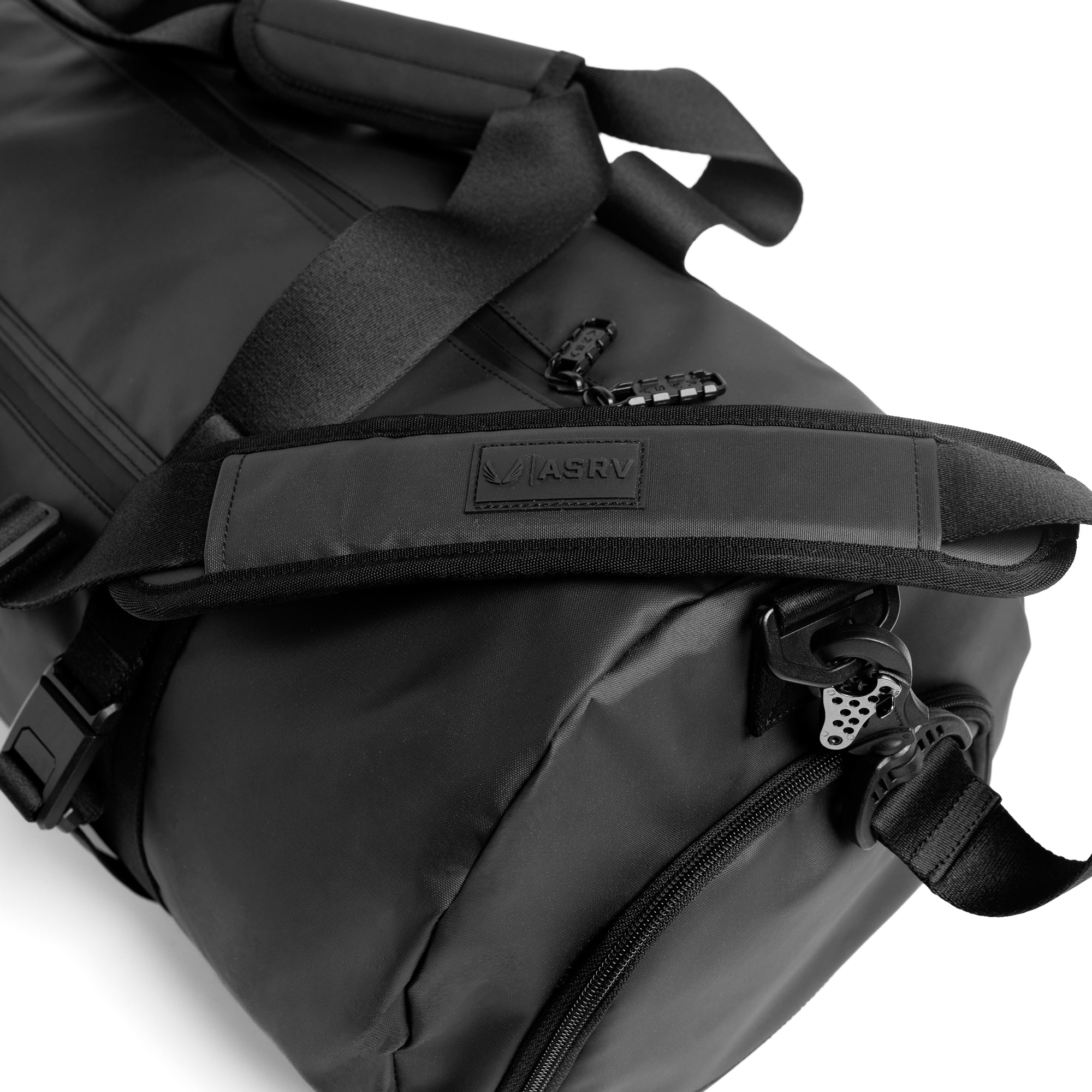 Flatlay water resistant barrel duffle bag 45L in black, angled view