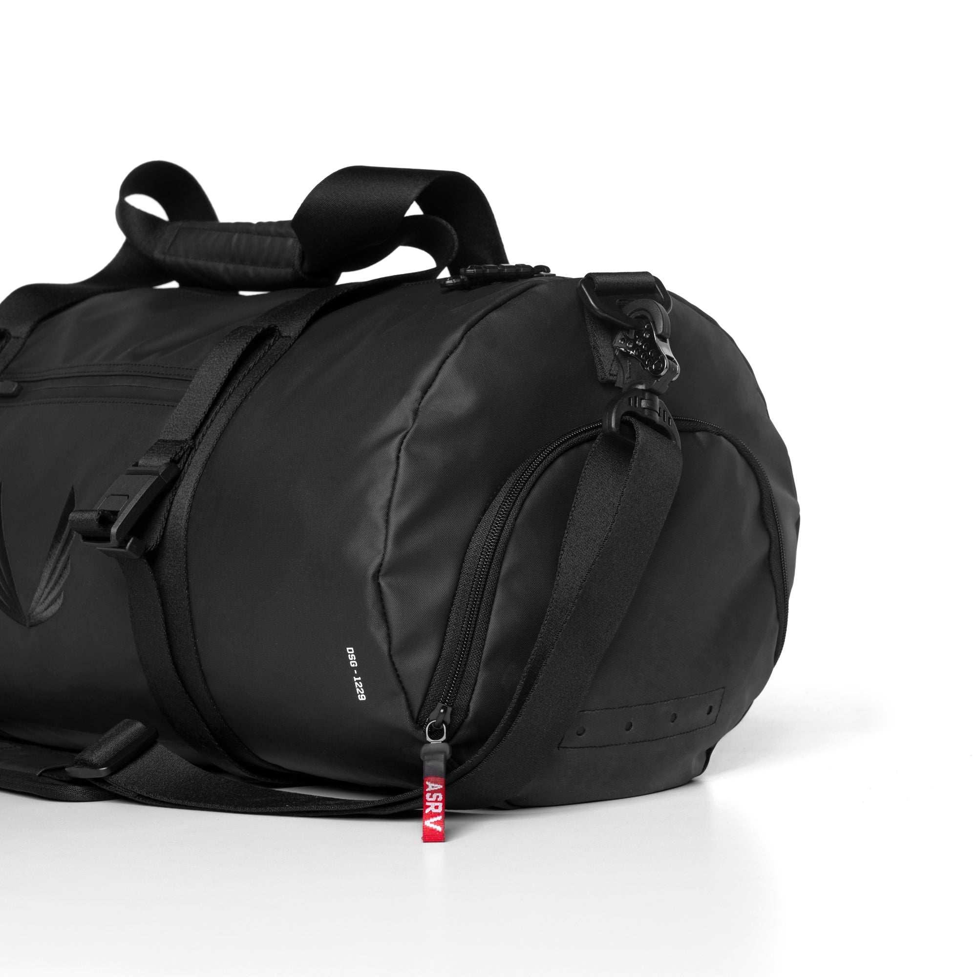 Flatlay Water Resistant Barrel Duffle Bag 45L in black, side view