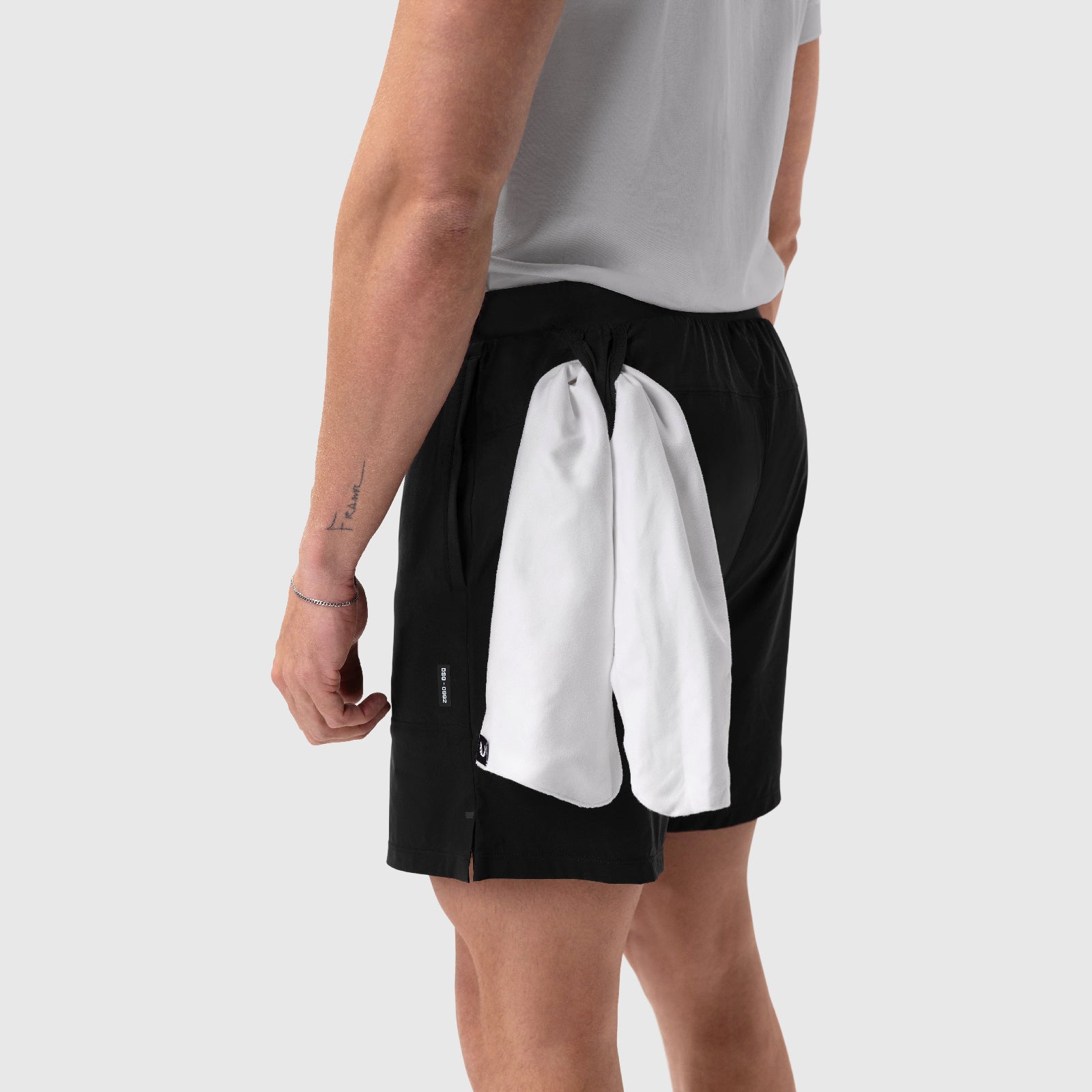 Aerotex™ 6" Training Short in black with white lining, side view on model