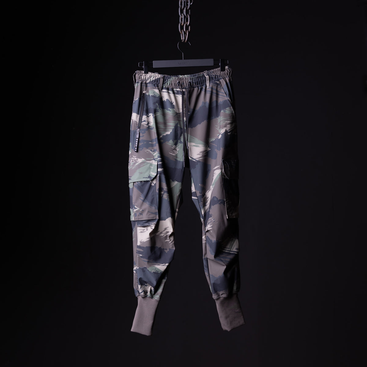 WN'20 Cargo High Rib Jogger in grey camo print, front view, on hanger