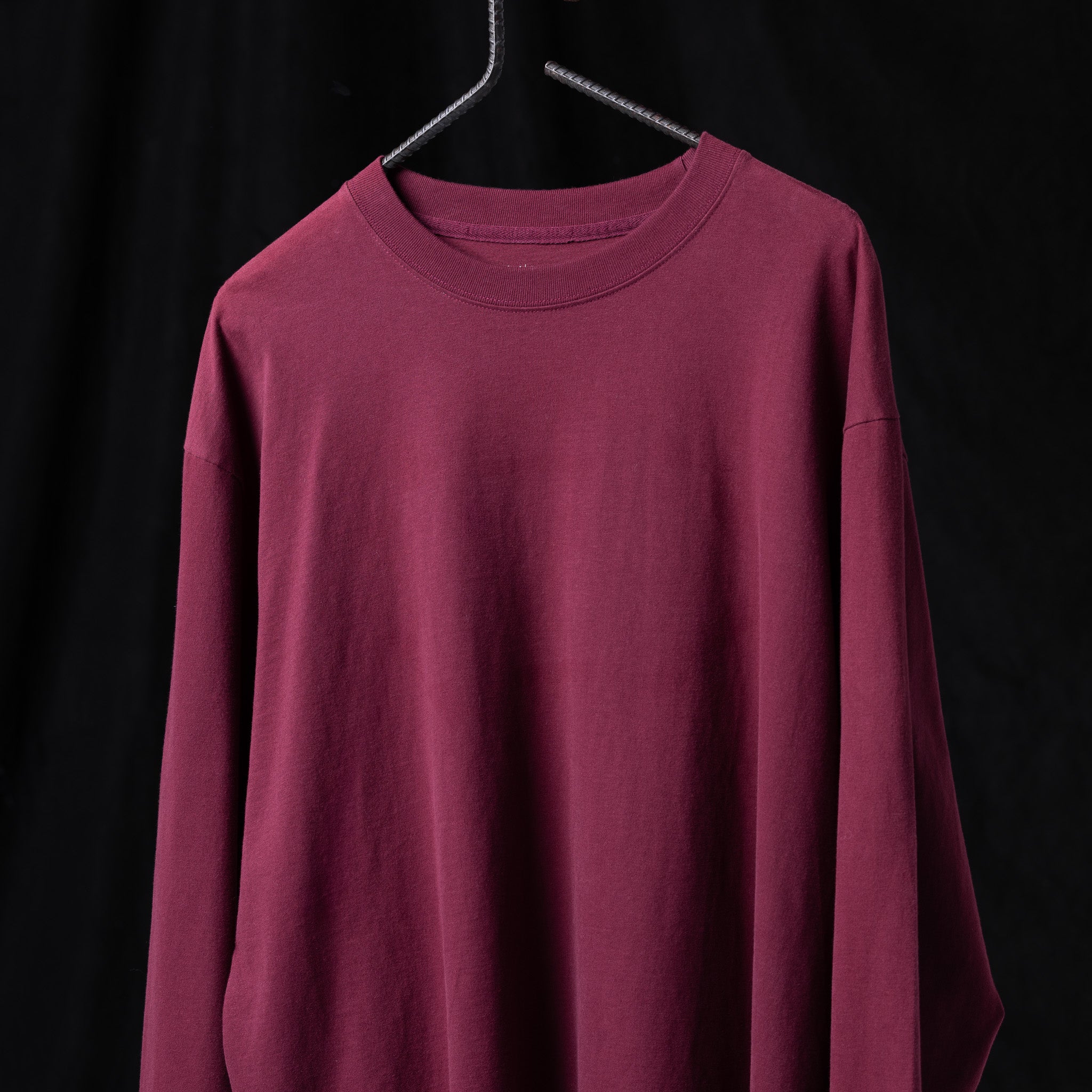 SM'22 Graphic Long Sleeve in burgundy on hanger, front view