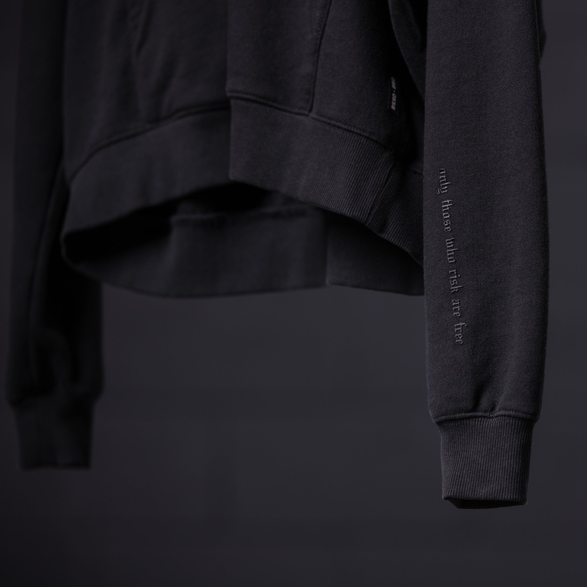 FA'20 Contrast Thread Hoodie in black, detail view of sleeve and cuff