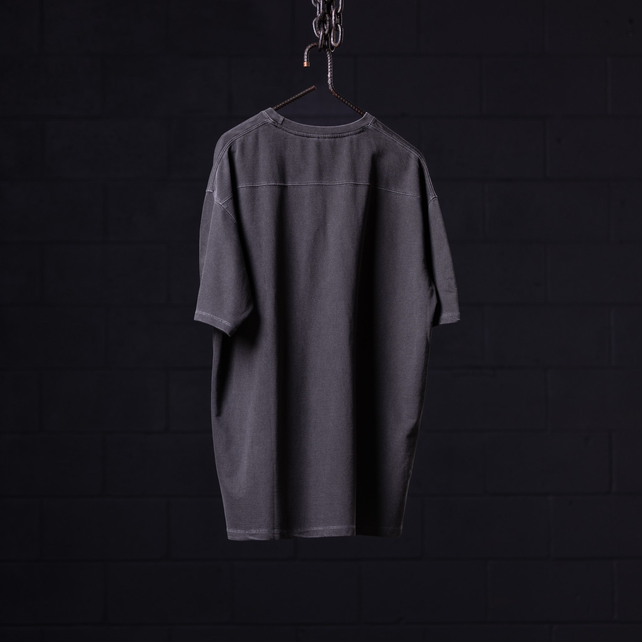 flatlay SP'22 Stone Washed Oversized Tee in charcoal grey, back view