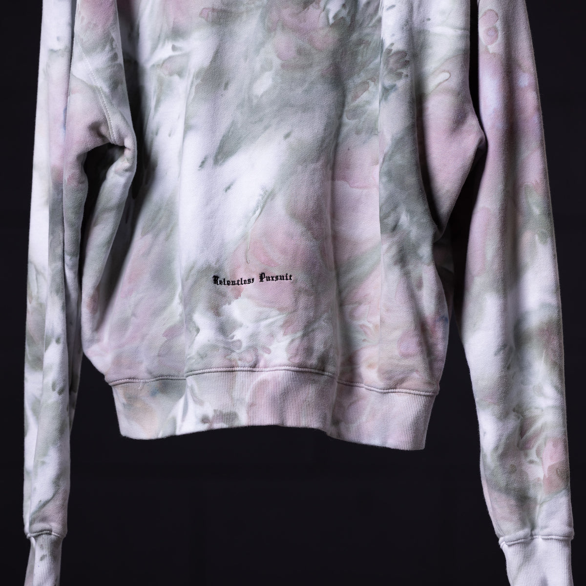 SM'22 Tie Dye Hoodie in pink and grey tie dye, front view on model