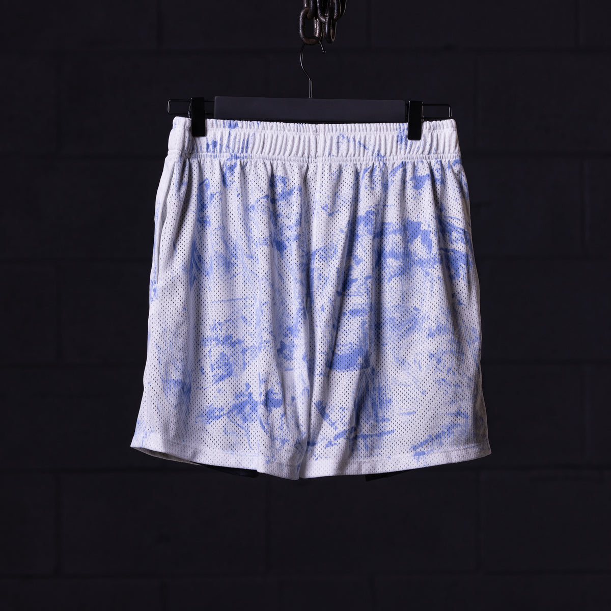SM'21 Tie Dye Mesh Liner Short in white and blue, front view, on hanger