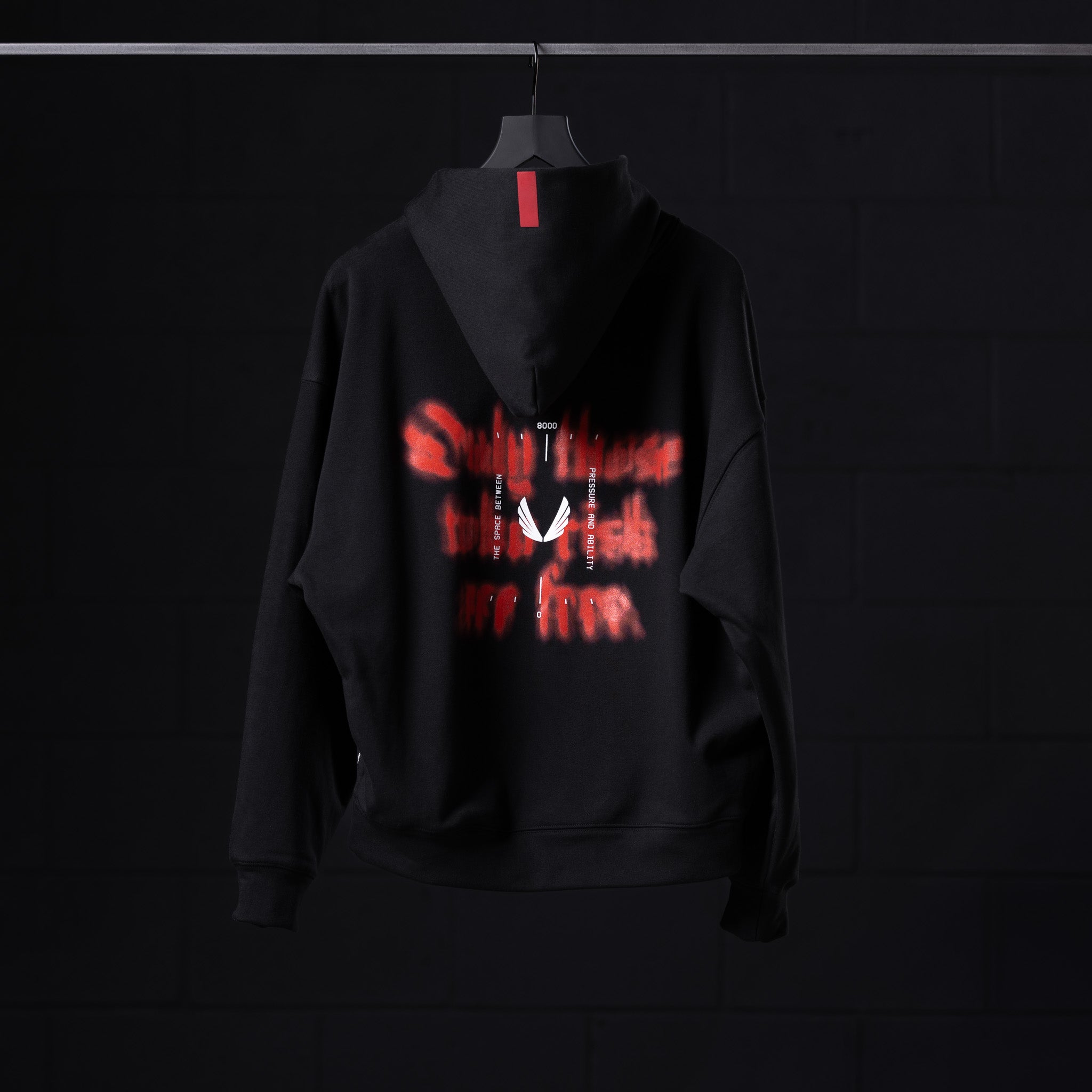 Flatlay Tech-Terry™ Zip Pocket Hoodie in black with red graphic print, front view
