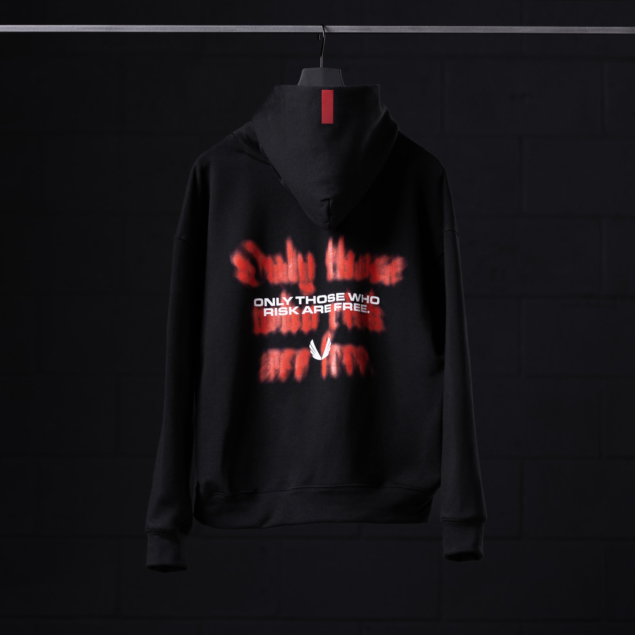 Flatlay Tech-Terry Zip Pocket Hoodie in black with red 'Risk Protocol' graphic design on mannequin
