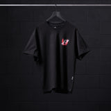 Black Tech Essential Relaxed Tee with red neon 'Infinite Mindset' graphic, displayed on hanger