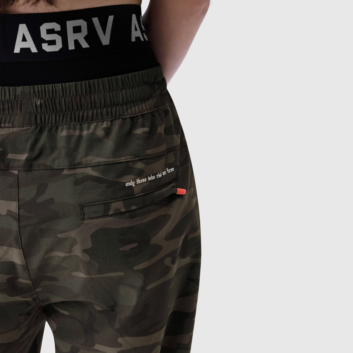 W036 Ripstop Relaxed Track Pant in Dark Camo, worn on model, side detail view