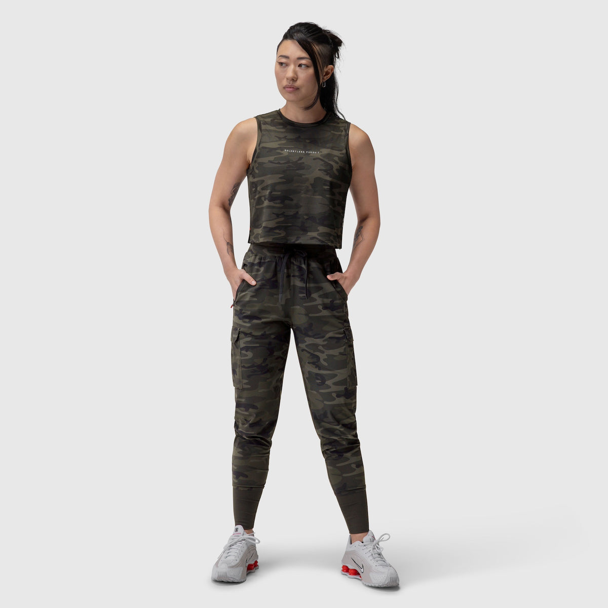 AeroSilver® Tank Top in dark camo worn with matching cargo joggers, front view