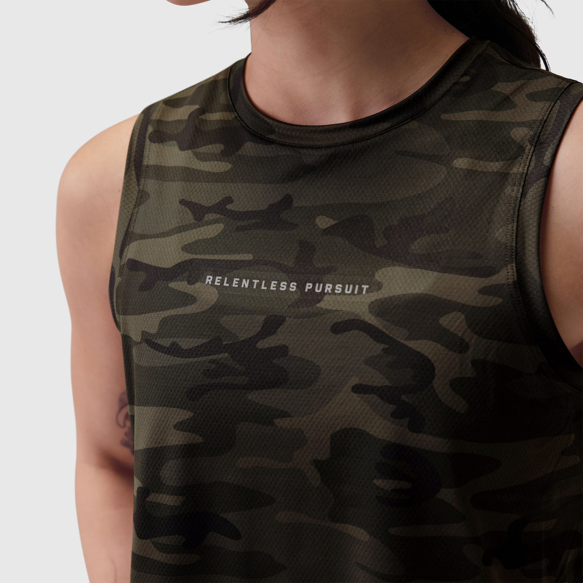 AeroSilver® Tank Top in dark camo with 'Relentless Pursuit' text, worn by model