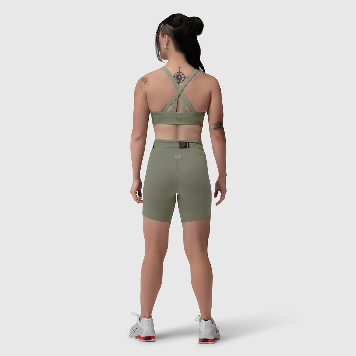 W039 Lycra Hybrid Sports Bra in sage, back view on model with matching shorts
