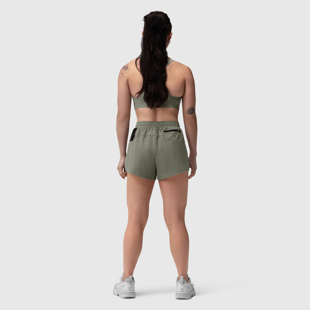 Tetra-Lite Linerless Short in sage, rear view on model