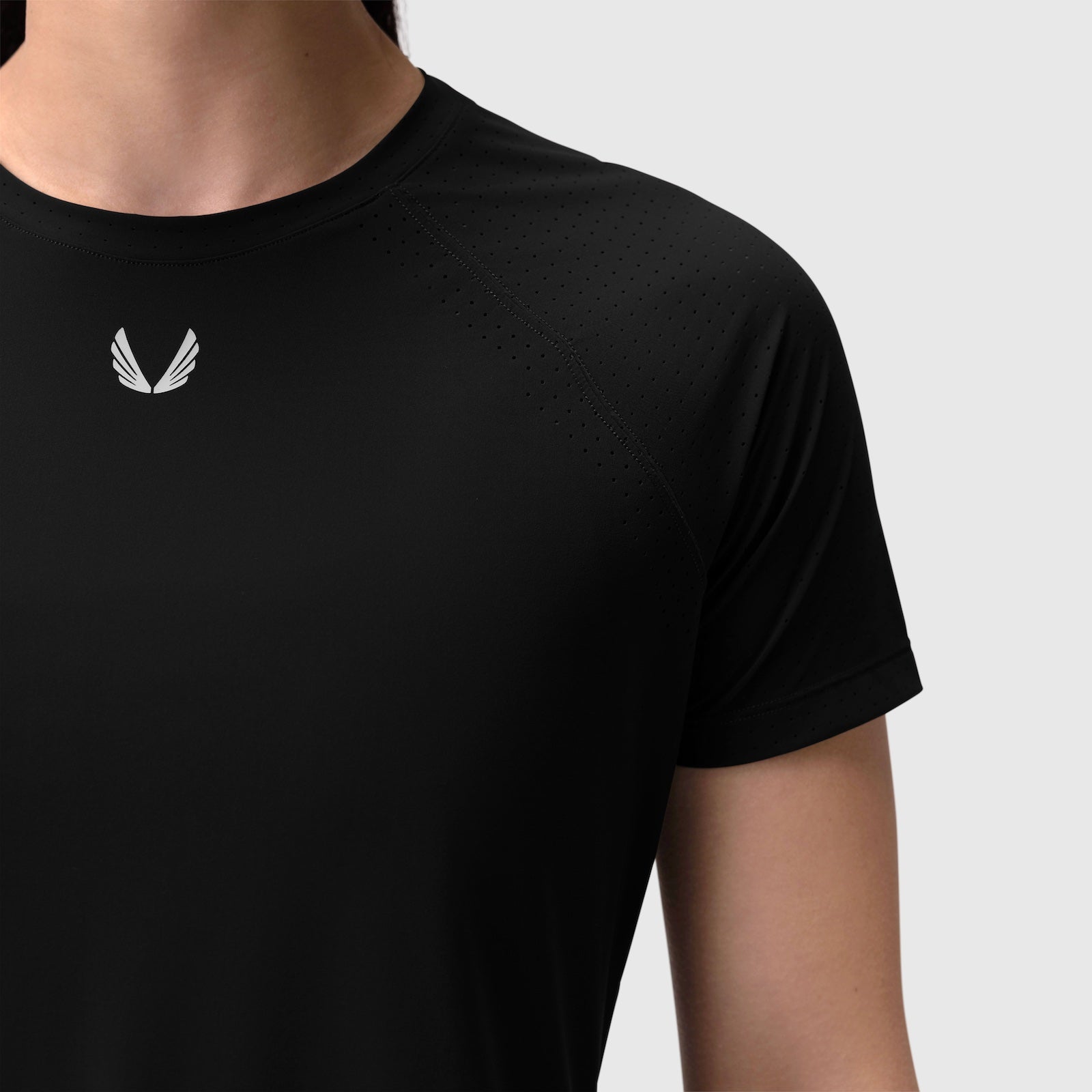 Black Laser-Vent Established Tee worn by model, front view showing small white logo