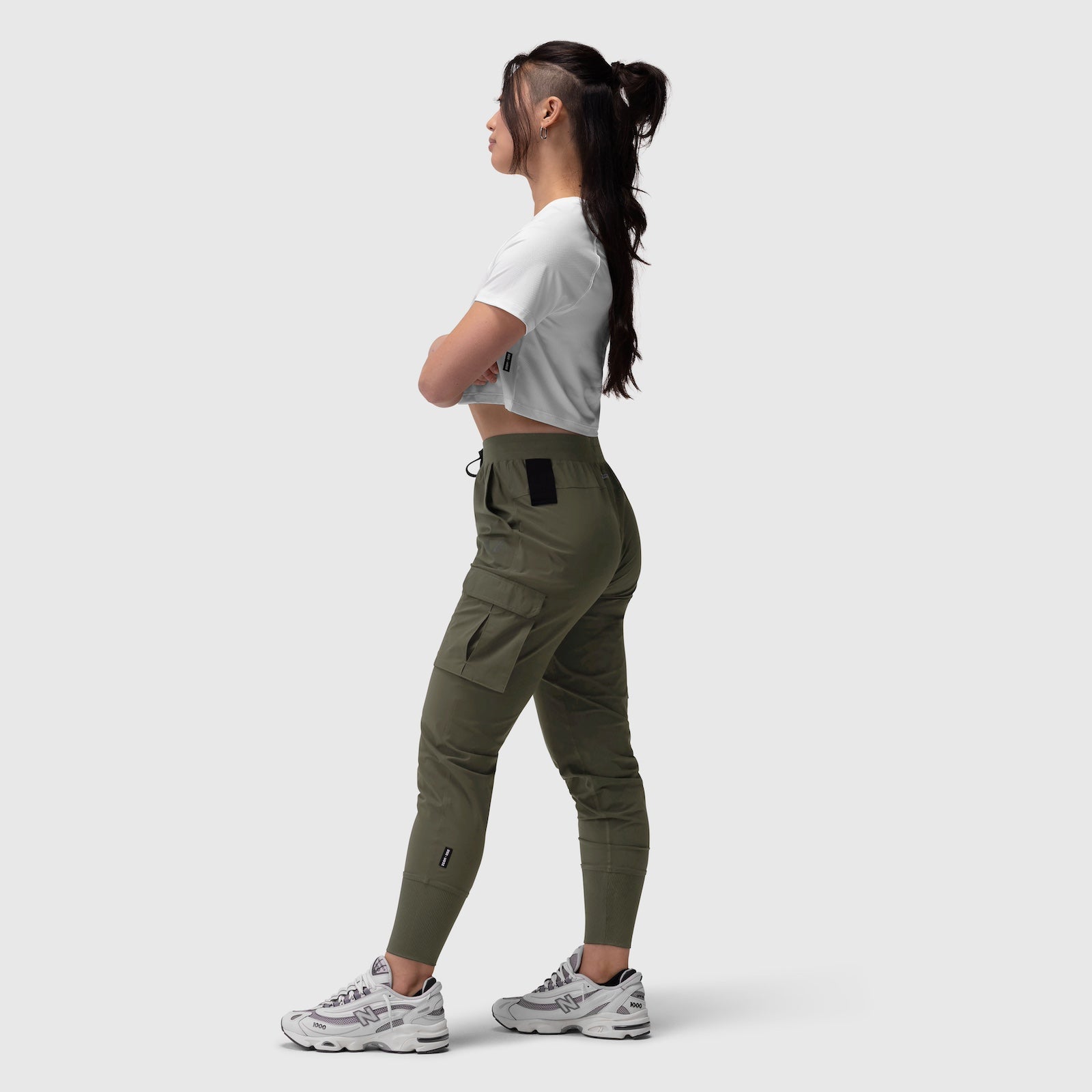 Tetra-Lite Cargo High Rib Jogger in olive, worn by model in side profile while jogging
