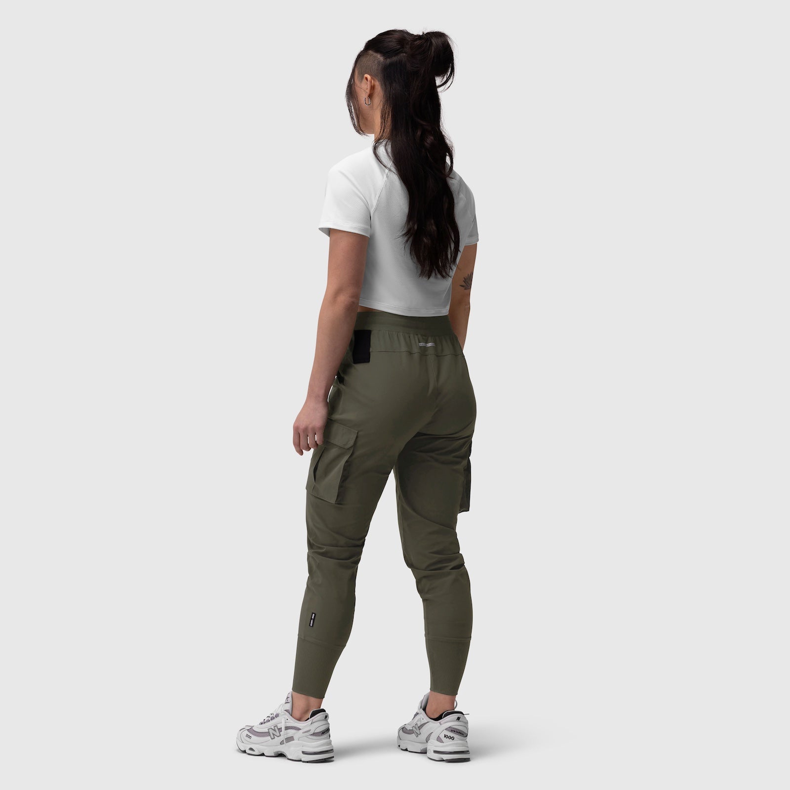 Tetra-Lite Cargo High Rib Jogger in olive, worn by model, back view