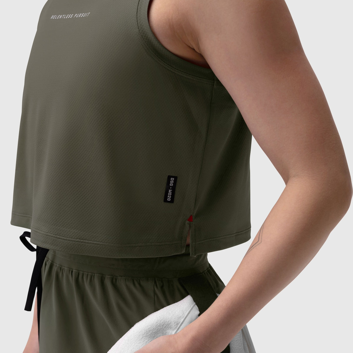 AeroSilver® Tank Top in olive, worn on model showing side profile and fit