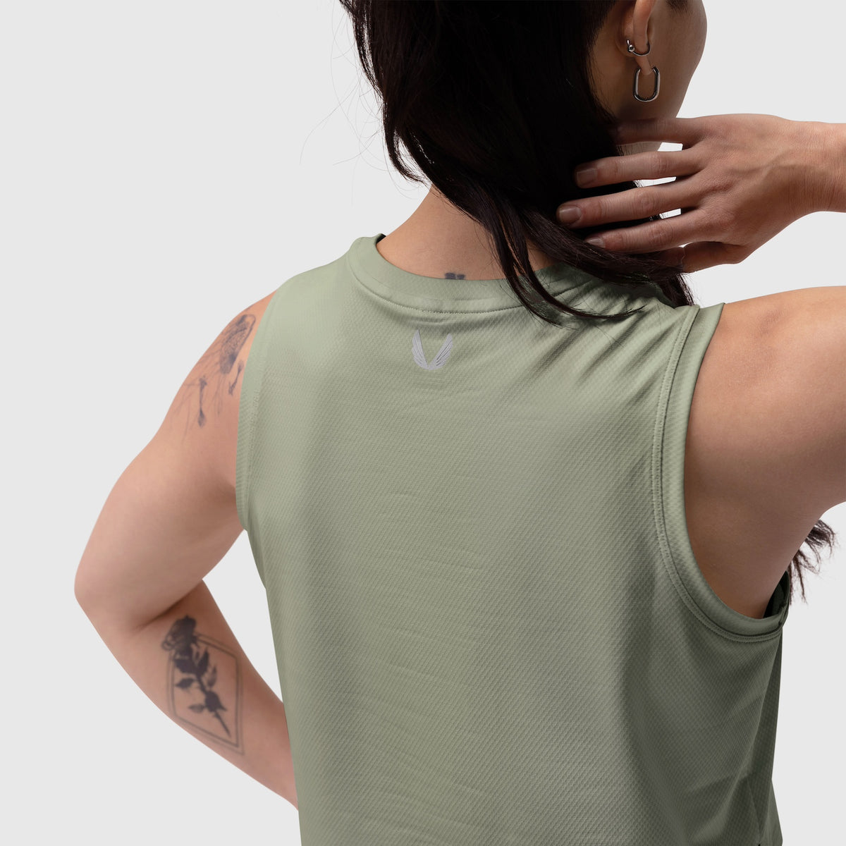 AeroSilver® Tank Top in sage worn by model from back view, showing fit and fabric
