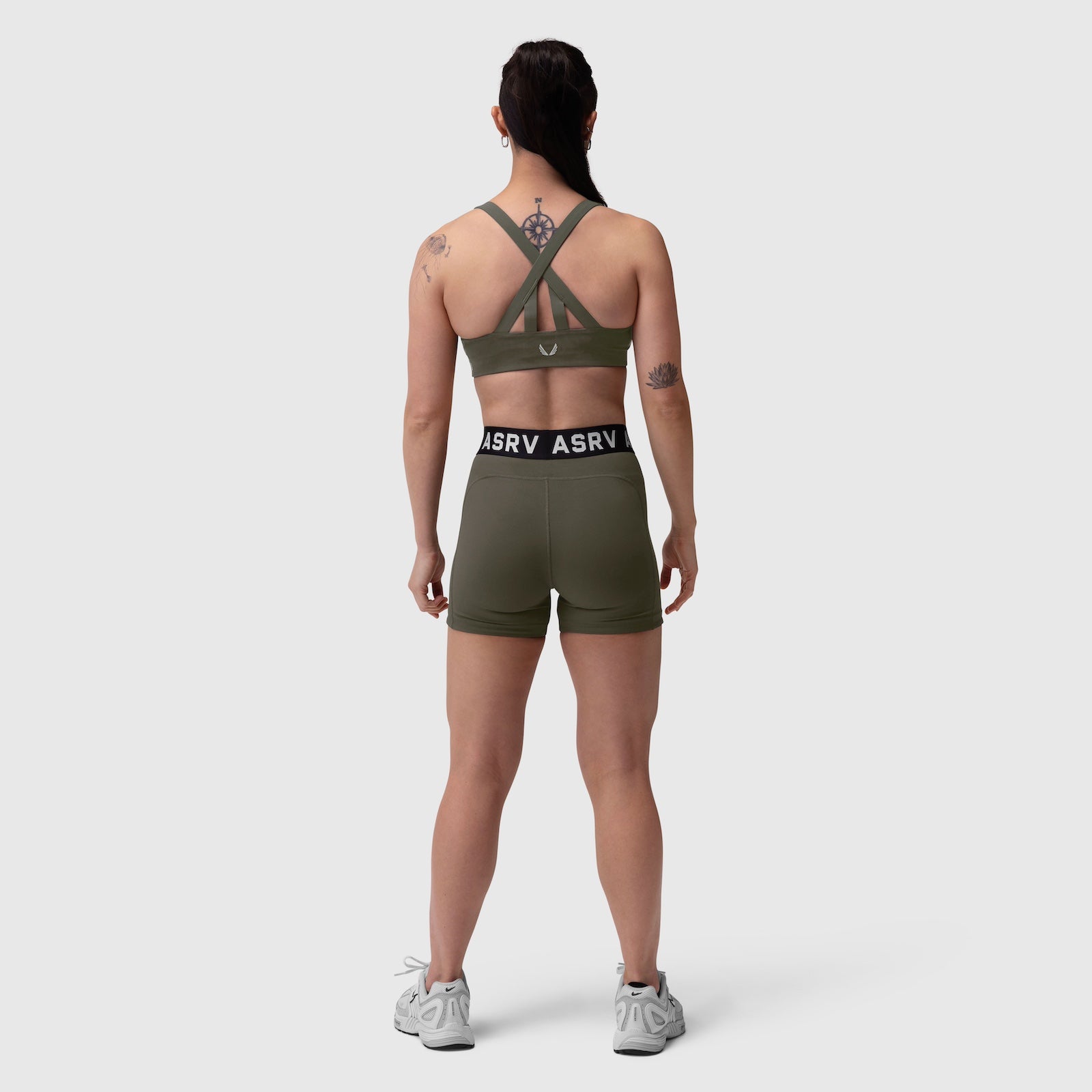 W039 Lycra Hybrid Sports Bra in olive, back view on model with cross-back straps