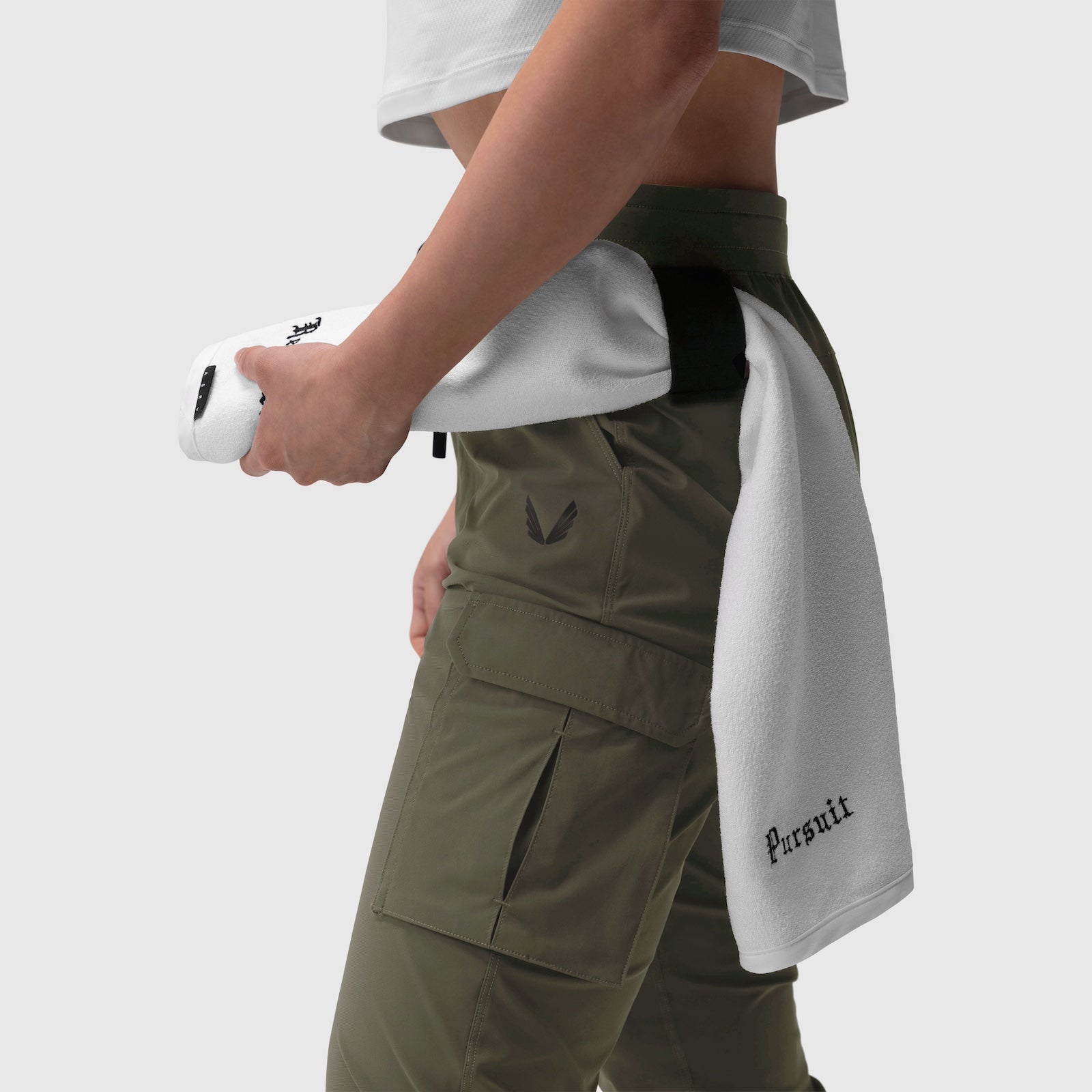 Tetra-Lite Cargo High Rib Jogger in olive, model wearing with white towel