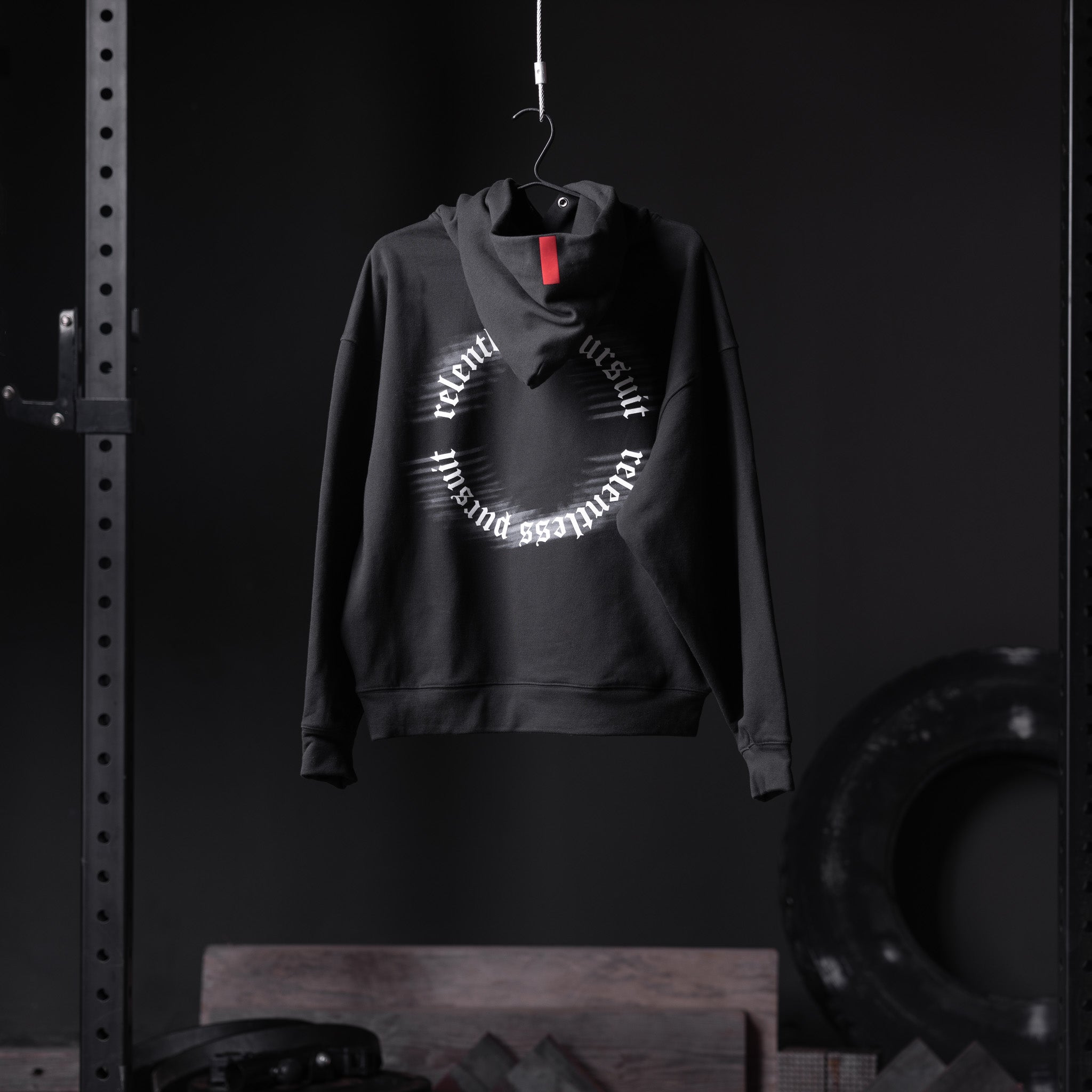 Flatlay Tech-Terry Zip Pocket Hoodie in black with circular text graphic, front view